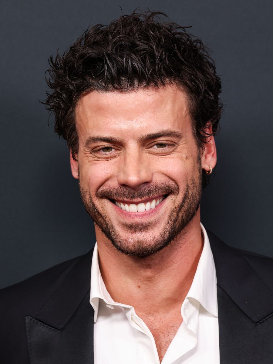 François Arnaud smiling at the 86th Peabody Awards
