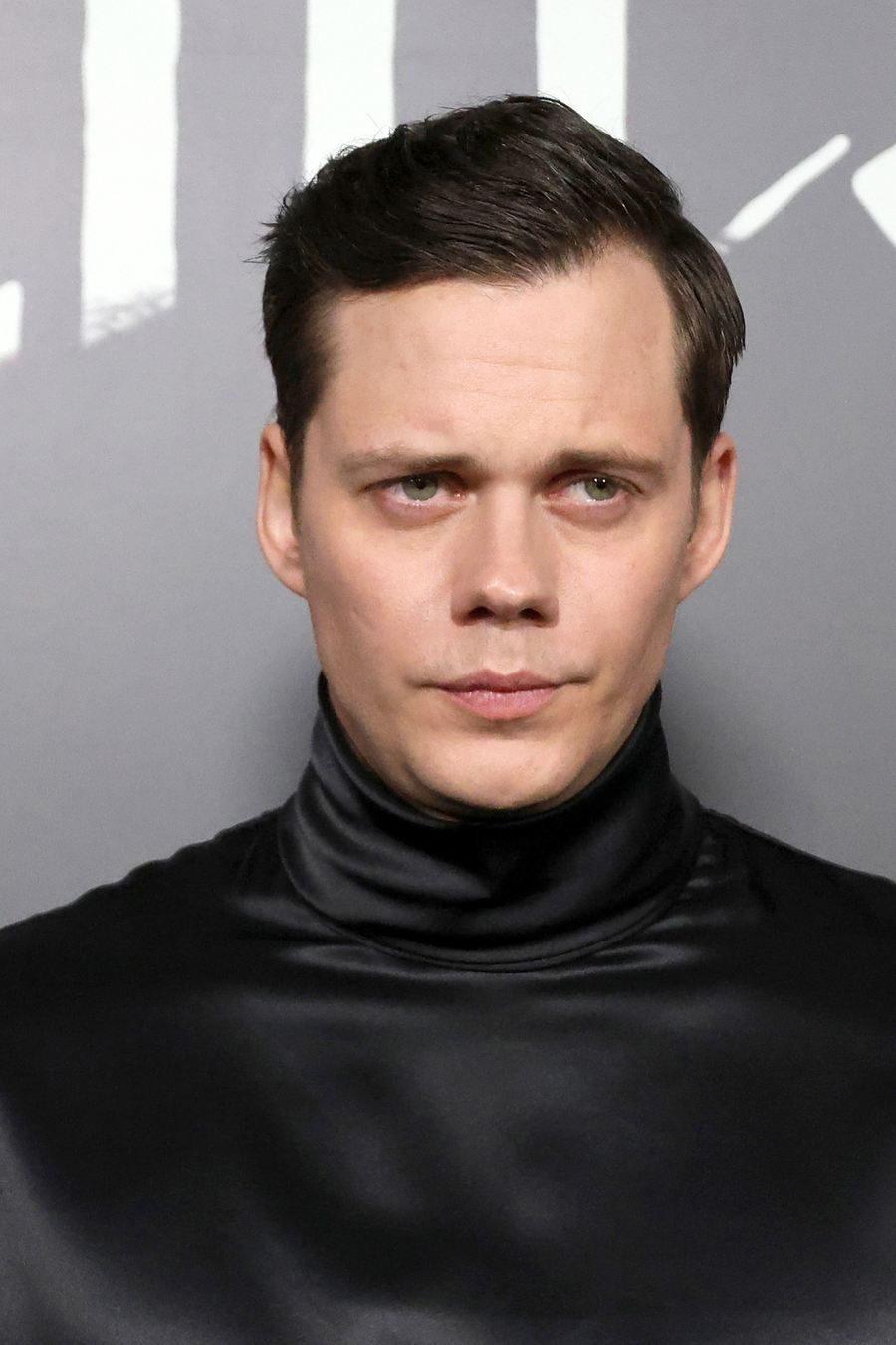 Bill Skarsgård in a black satin turtleneck at the Nosferatu premiere