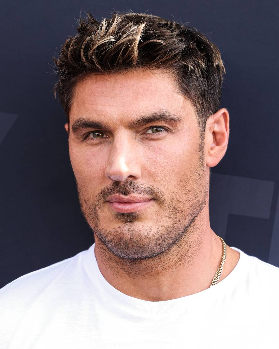 Chris Appleton in a white T-shirt on the red carpet