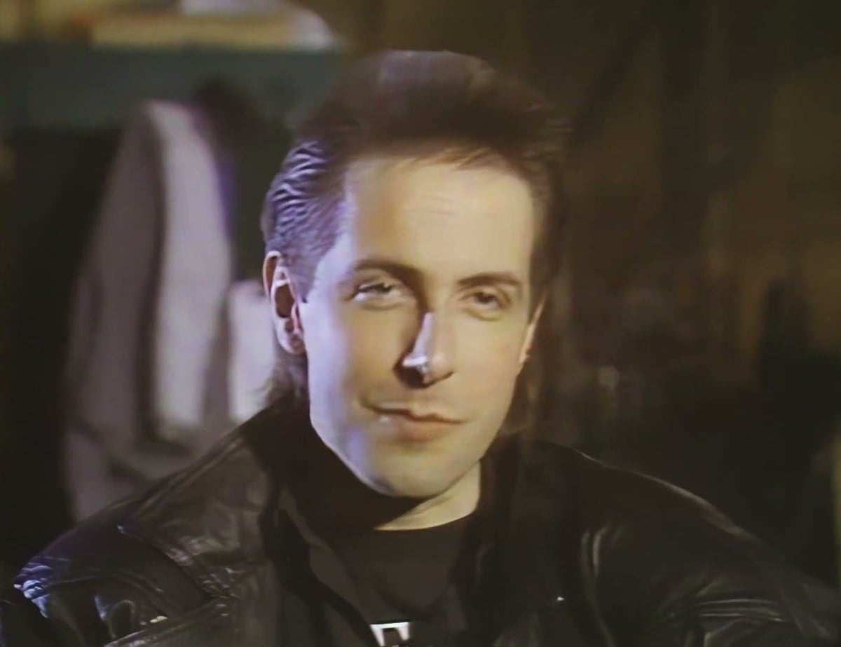 Clive Barker in a black leather jacket during a 1988 interview on the Hellraiser II set