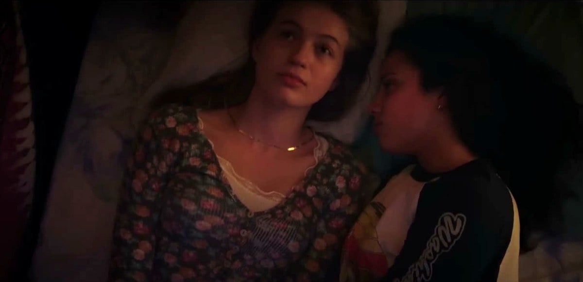 Olivia Scott Welch and Kiana Madeira lying side by side as Sam and Deena in Fear Street