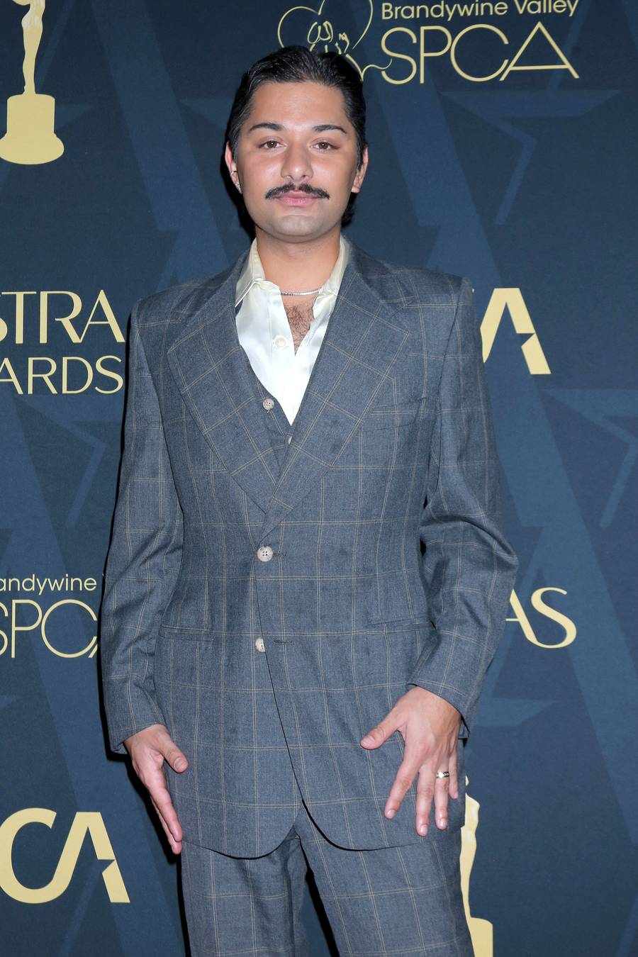 Mark Indelicato in a gray plaid suit at the 2026 Astra TV Awards